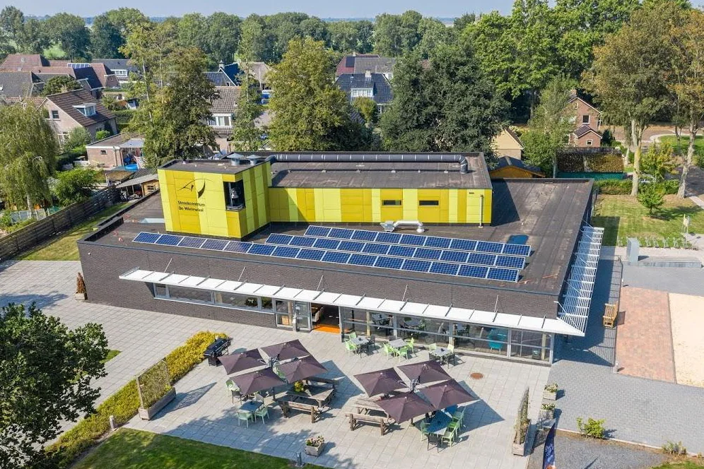 MFC De Wielewaal — Het dorp als omgeving