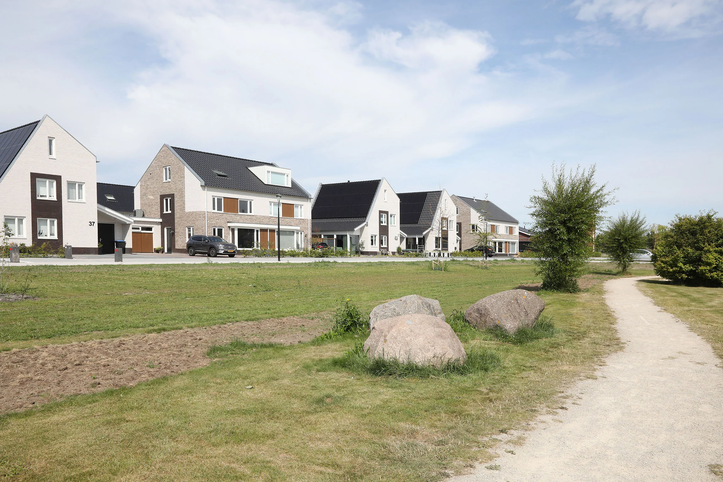 Negen woningen De Gilden — Wonen aan een open rand