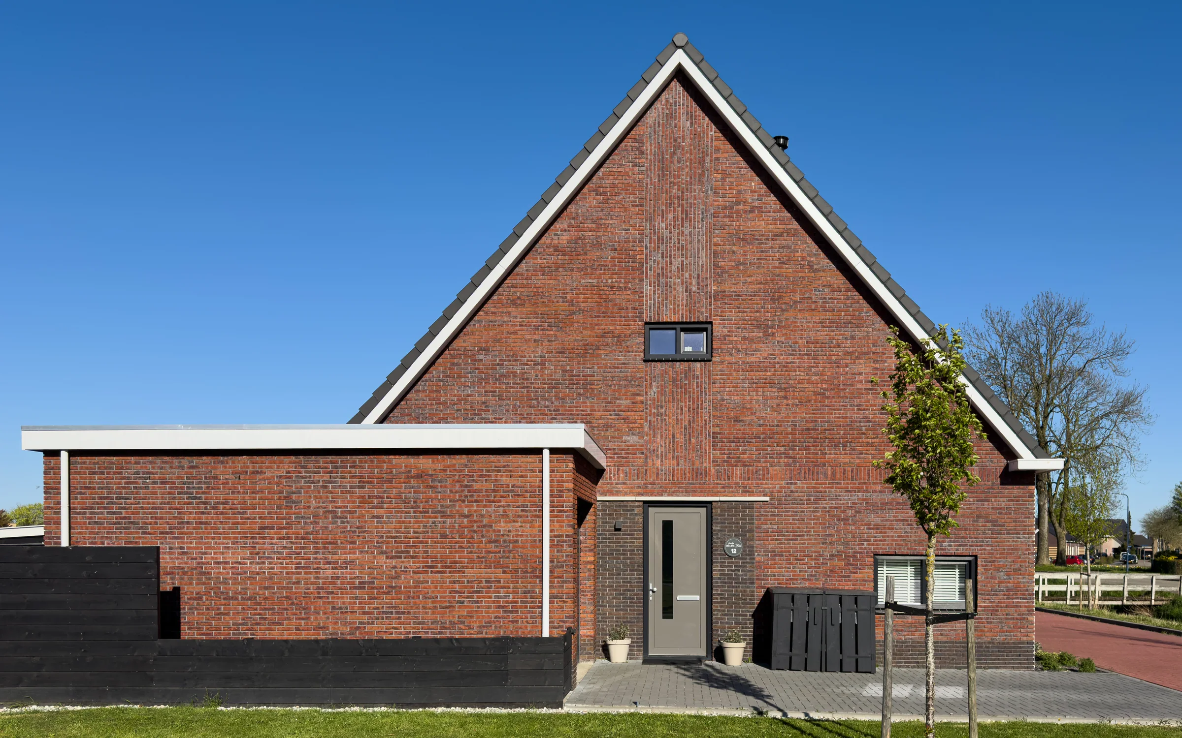 Twaalf woningen Winsum — Een rustige kop aan de rij