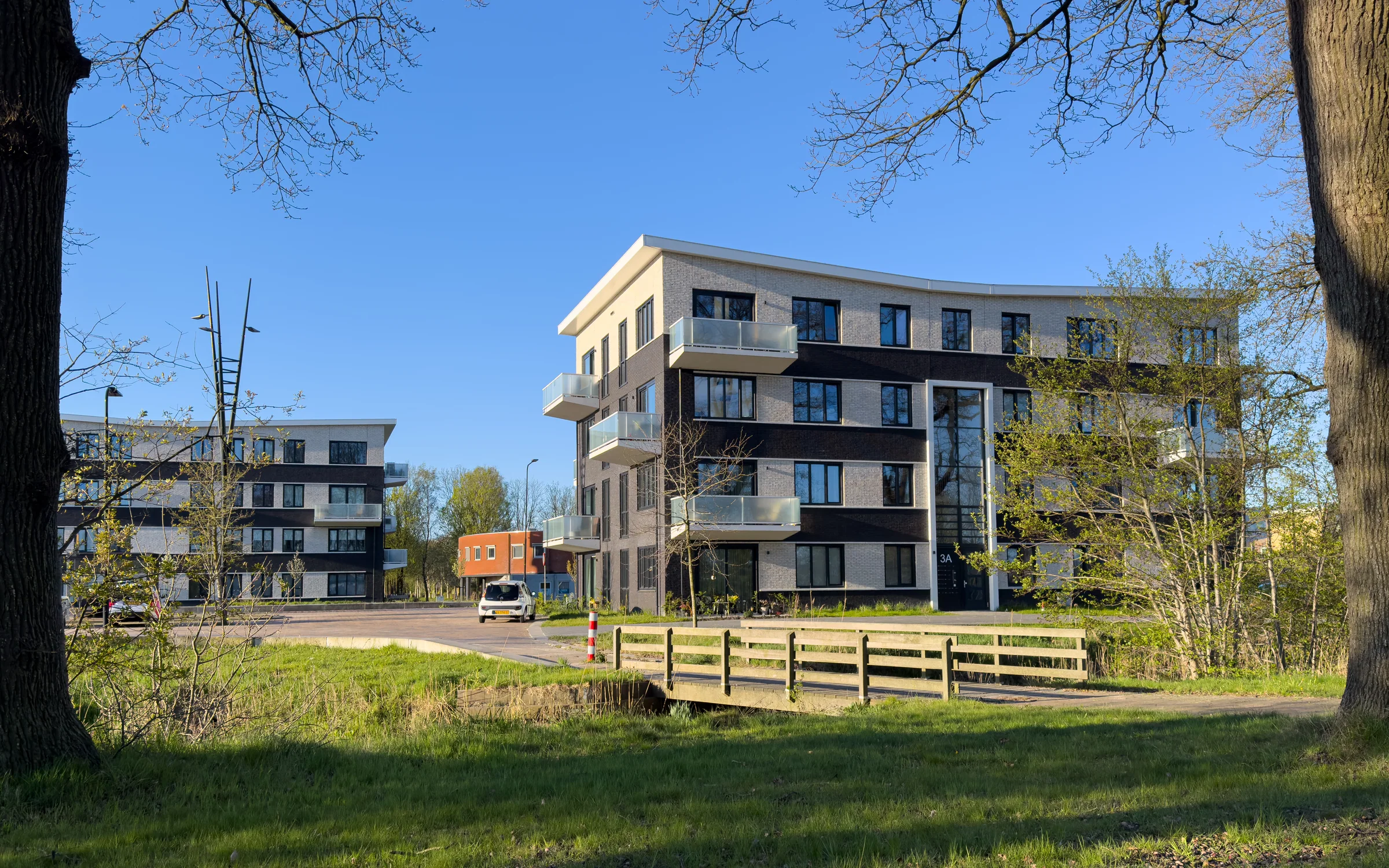 Woongebouwen stationsgebied — Samenhang op afstand